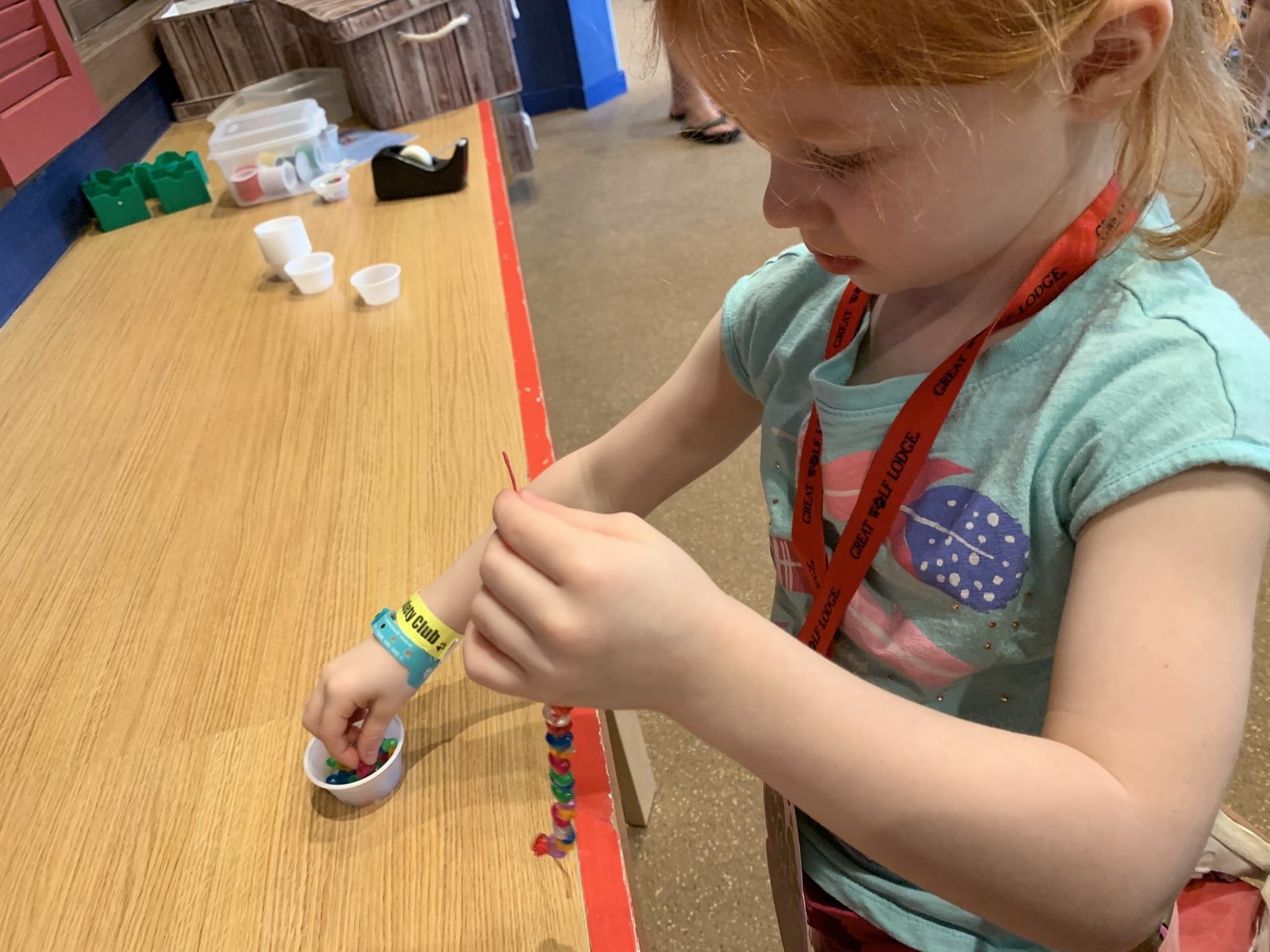 Great Wolf Lodge Summer Camp-In making beaded bracelet