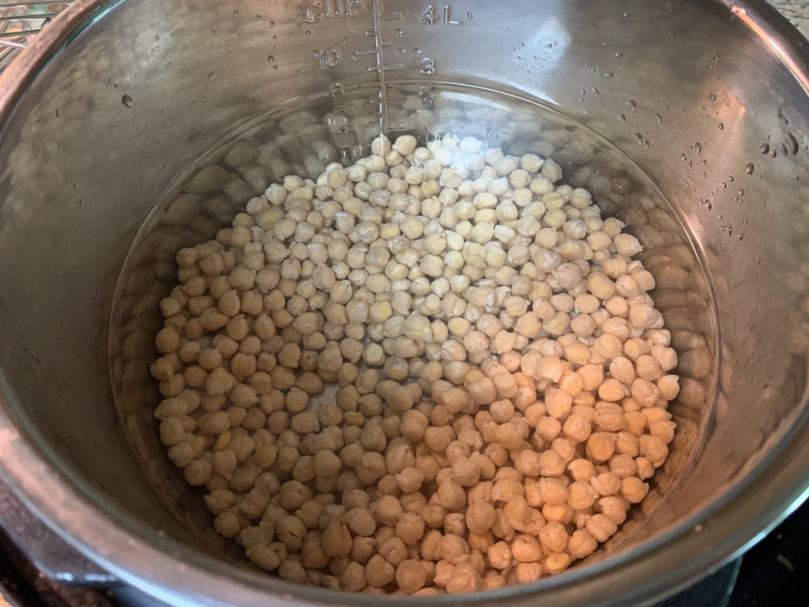 filling instant pot with chickpeas