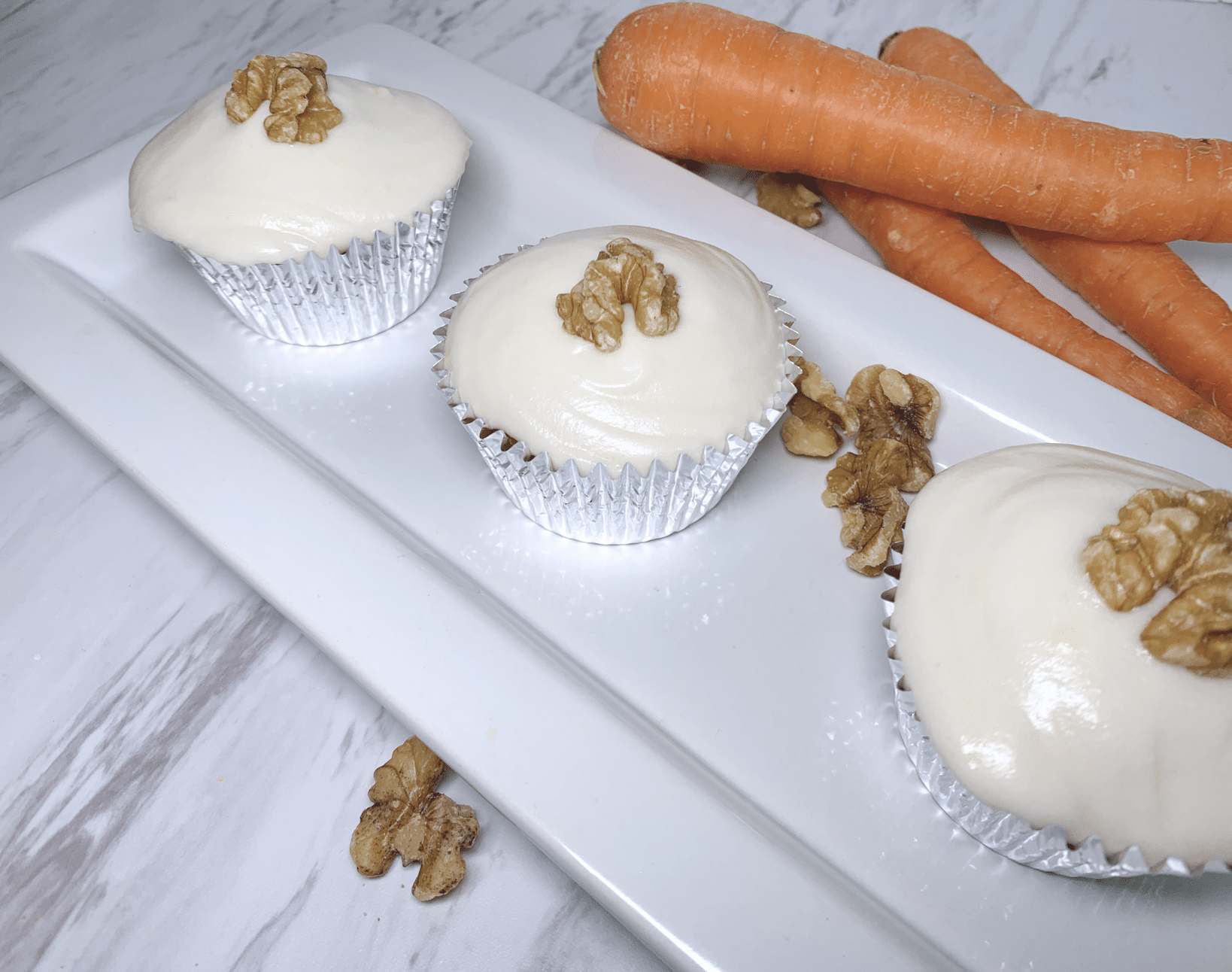 Carrot cake cupcakes gluten free dairy free three on a plate