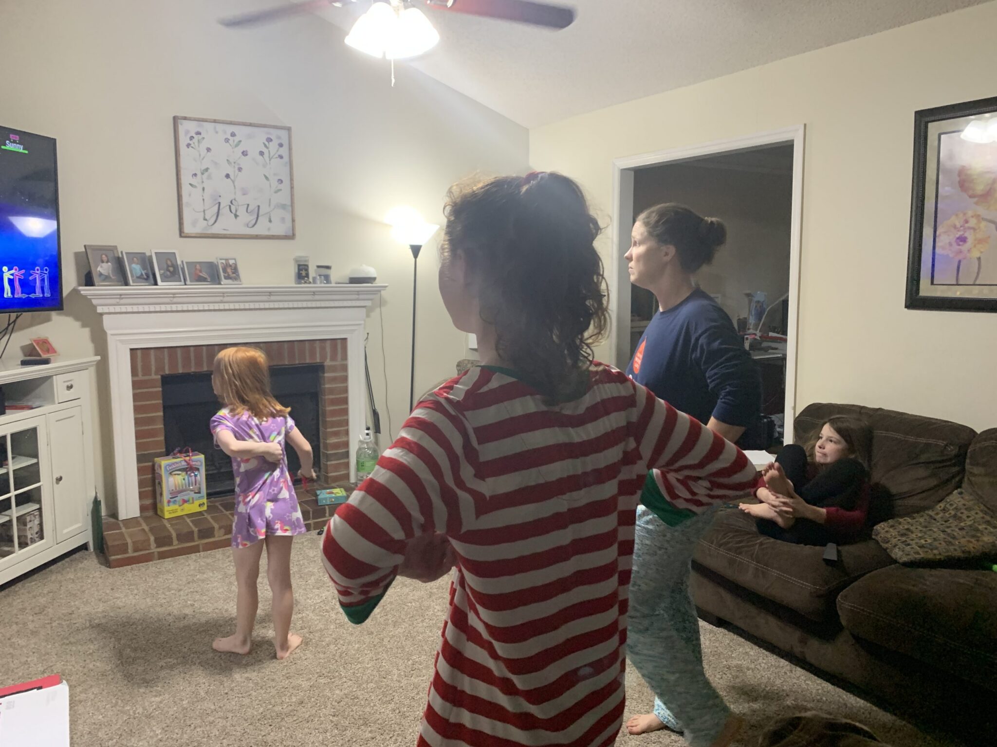 Family playing just dance 2021