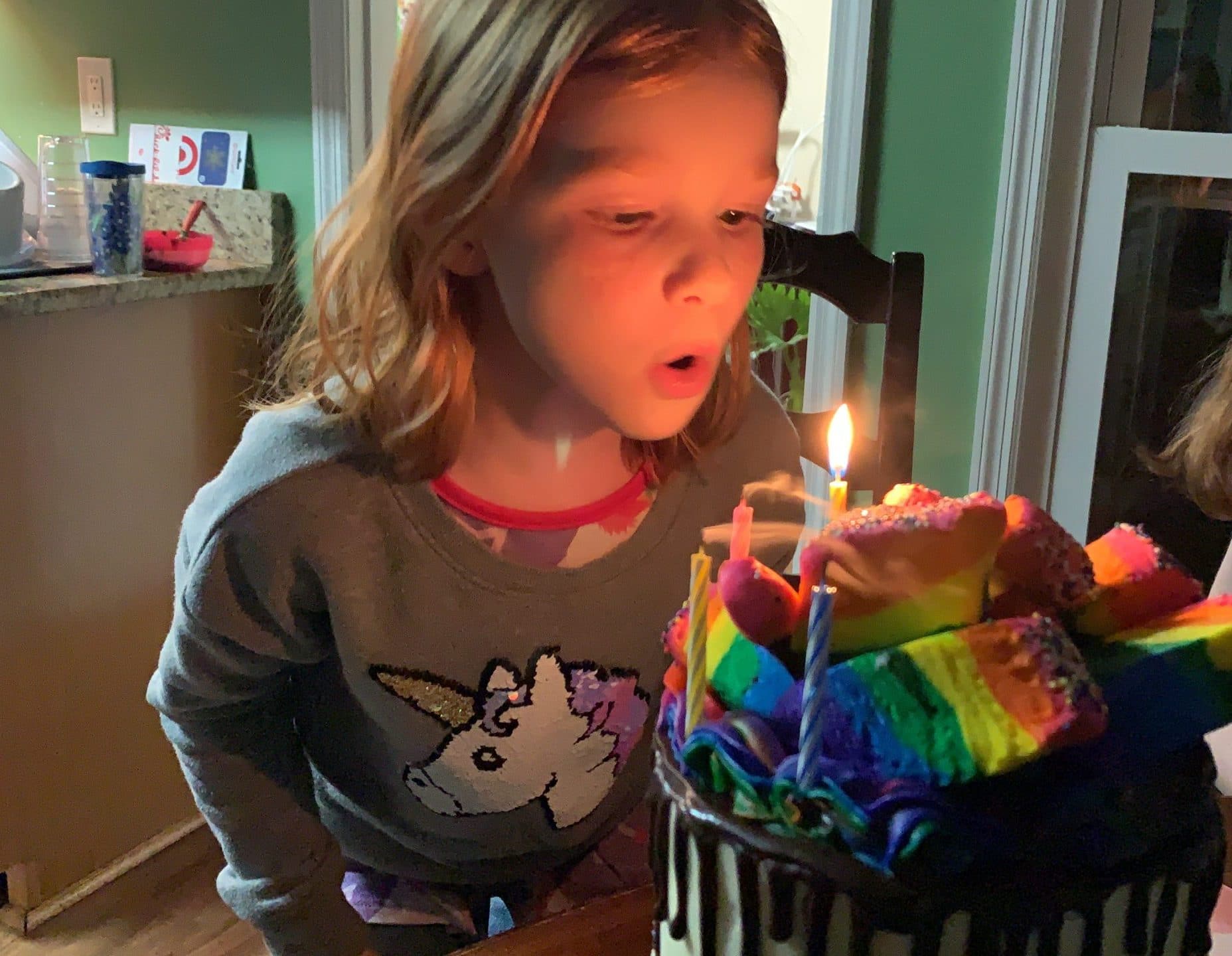Happy 7th birthday B with candles and cake