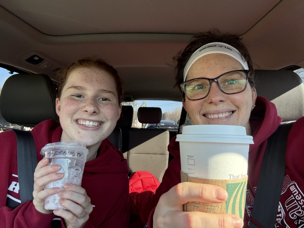 Post hot yoga coffee In the car with mother and daughter